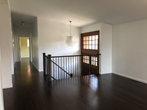 Whose to say everything has to be minimalistic, though? We loved this foyer light fixture.